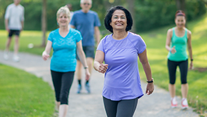 women walking and getting active in park