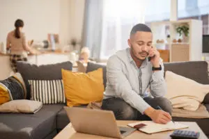 Man on phone in living room