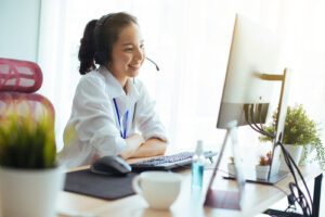 Secure online coaching for mental health support and well-being Online mental health coach conducting a session through video conferencing tools