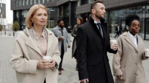 Case Study: Integrated Healthcare System Increased Health Coaching Engagement 4 A diverse group of professionals walking outdoors in conversation, illustrating informal team engagement through walking meetings.