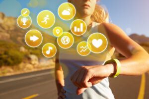 Woman checking her fitness tracker outdoors with wellness and activity icons overlaid, representing smart recovery and data-driven self-care.