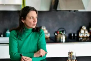 Concerned woman reflecting on early warning signs of substance use becoming a problem