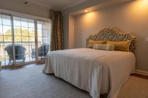 Bright, serene bedroom with natural light and warm neutral tones promoting restful sleep