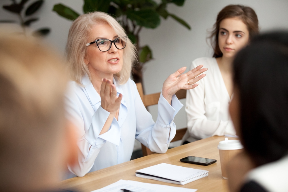 HR and benefits team planning a 2026 employee well-being strategy meeting
