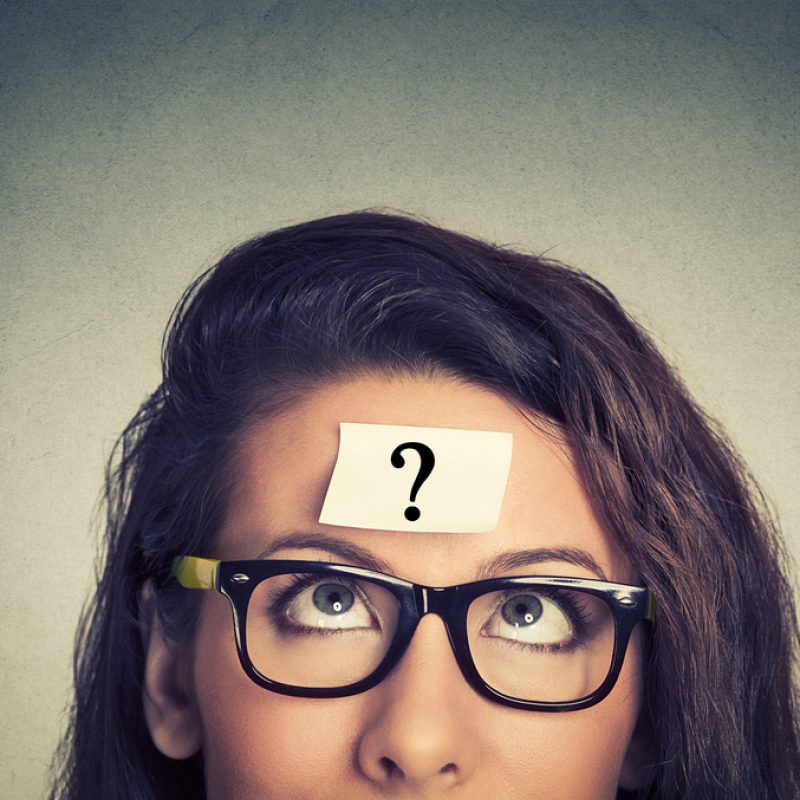 Person with question mark representing internal confusion, cognitive patterns, and why behavior change fails